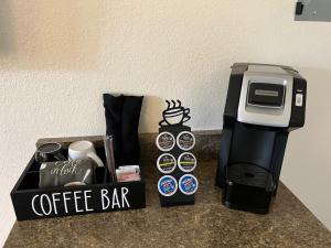 a coffee station with a coffee bar and a coffeemaker at Antlers Inn in Chester