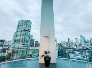 a view of a city skyline from a building at Hotel Residence at Novotel in Manila