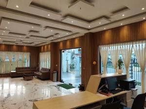 a lobby with a desk and a living room at Aryans Sea Sight Resort Mandarmani in Mandarmoni +71 photos