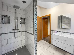 a bathroom with a shower and a sink at The Wendover in Rowen