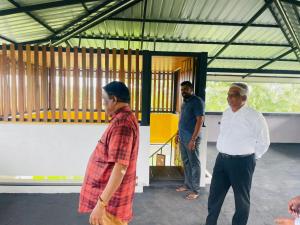 a group of people standing in a building at Green Crown Villa in Polonnaruwa