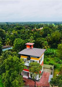 a house in the middle of a forest at Green Crown Villa in Polonnaruwa