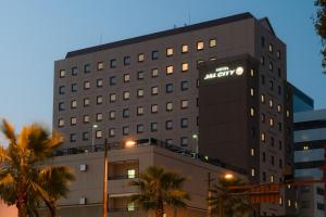 a hotel with aania sign on the side of a building at Hotel JAL City Miyazaki in Miyazaki +13 photos