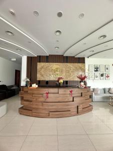 a lobby with a reception desk in a building at Khu Nghỉ Dưỡng Ivory Villa Resort in Lương Sơn +48 photos