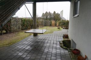 a bench sitting in the middle of a patio at Auszeit in Limbach