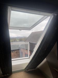 a window with a view of a roof at The Bear Tattenhall in Tattenhall
