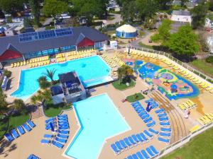 an aerial view of a swimming pool at a resort at l'impasse de la tranquillité in Pont-Aven +6 photos