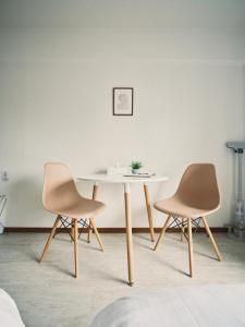 a table and two chairs in a room at vetta kumamoto suizenji2 308 in Kumamoto +31 photos