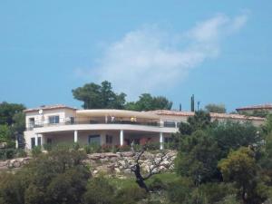 a house on top of a hill with trees at Opulent Villa in Les Adrets de l Est rel in LʼÉglise