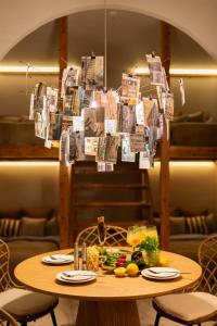 a table in a restaurant with money hanging over it at SUNZ ROOMS -naha miebashi- in Naha +68 photos