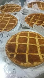 a group of waffles sitting on a table at Guesthouse La Locanda - Comfy Rooms & Local Food in Porto San Paolo