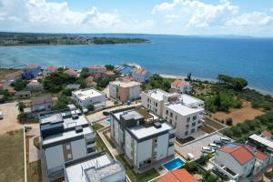 an aerial view of a town next to the water at Starview in Privlaka
