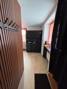 a room with a kitchen with a counter top at esperanza in Vizille