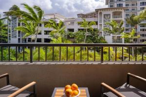 a bowl of fruit on a table on a balcony at Marriott's Maui Ocean Club - Molokai, Maui & Lanai Towers in Lahaina