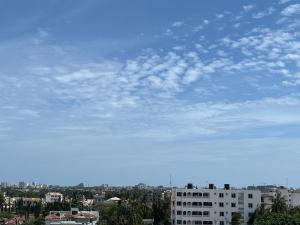 a blue sky with clouds over a city at Skyview Bamburi Suites in Mombasa +8 photos