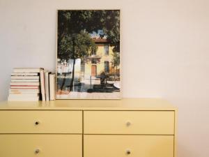 a dresser with a picture on top of it at Atelier7419 Songpa in Seoul +29 photos