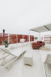 a living room with a couch and a table at Palazzo Mimì in Bitritto