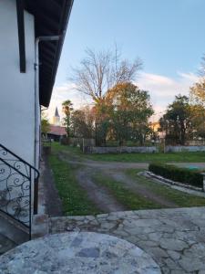 a view of a driveway from a porch of a house at Roger's appartement in Larrivière