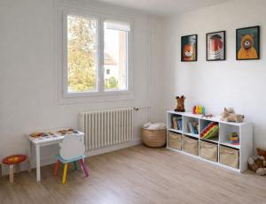 a white room with a desk and a window at L'entracte in Clairvaux-les-Lacs +7 photos