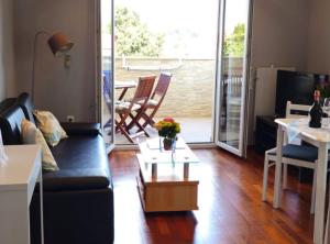 a living room with a couch and a table at Villa Tena Rovinj Istria in Rovinj