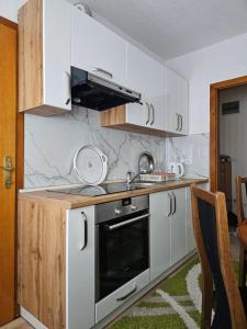 Cuina o zona de cuina de Apartman Iman1