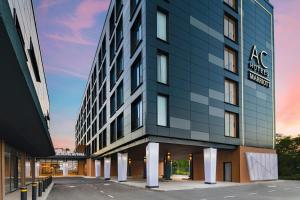 a rendering of a hotel with a building at AC Hotel by Marriott Georgetown Guyana in Georgetown
