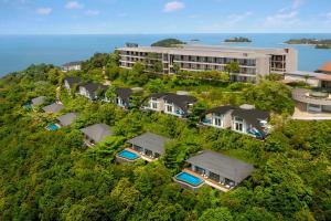 an aerial view of a resort on a hill at The Westin Nirup Island Resort & Spa in Belakangpandang