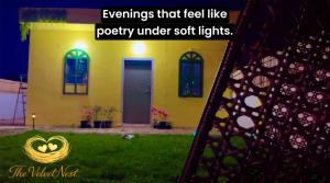 a yellow house with a door and a window at The Velvet Nest - Gurgaon - Luxurious Single Bedroom Private Villa with Garden in Gurgaon