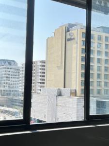a view of a large building from a window at Finagaello 3 bedrooms-Self catering at 77 on Independence in Windhoek