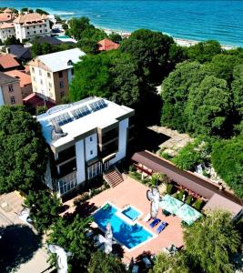 an aerial view of a house with a swimming pool at Naparis Boutique in Eforie Sud