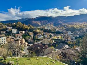 an aerial view of a city with mountains in the background at Hotel Monte Viglio in Filettino