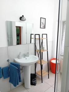 a bathroom with a sink and a mirror at Ca' melindetta in Recetto +15 photos