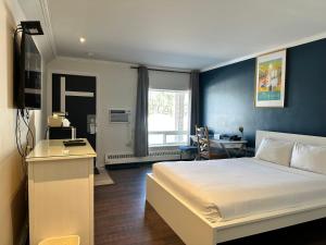 Llit o llits en una habitació de Cloud 9 Inn