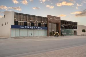 a large building with a building with at فندق ارجان بارك طويق 2 in Riyadh