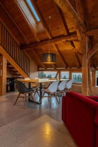 a dining room with a table and chairs at Reichart Apartment in Lochau