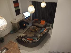 an aerial view of a living room with a couch and chair at Teach Sile in Kiltimagh