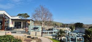 a group of boats parked outside of a building at Caravan J&L Weymouth Bay in Weymouth
