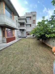 an empty yard in front of a building at Happy Homes in Jammu