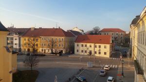 a view of a city with buildings and a parking lot at Penzion TGM in Příbram