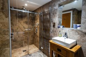a bathroom with a sink and a shower at Rivington Barn in Kerne Bridge +96 photos