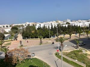 a view of a street with a city in the background at Maison Fatima in Mahdia
