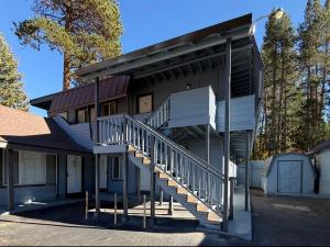 a house with a staircase on the side of it at Tahoe Sands Inn in South Lake Tahoe +44 photos