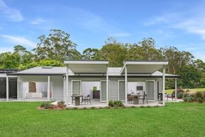 a rendering of a house with a yard at Grovebrook Cottage, Broughton in Woodhill