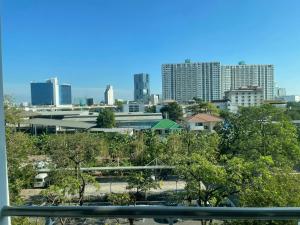 a view of a city skyline with tall buildings at Bts studio rooms in Bangna
