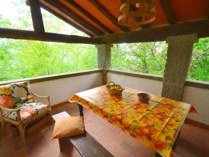 A balcony or terrace at Holiday Home in Tuscany near Abetone Ski Lift