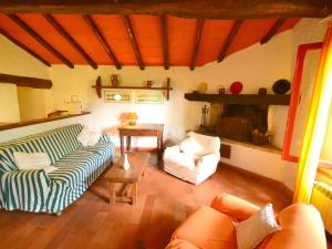 A seating area at Holiday Home in Tuscany near Abetone Ski Lift