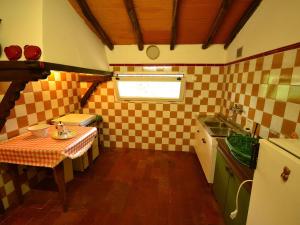 A kitchen or kitchenette at Holiday Home in Tuscany near Abetone Ski Lift