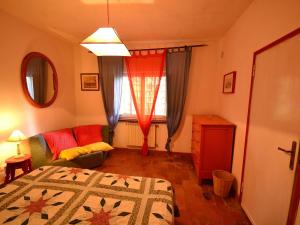 A bed or beds in a room at Holiday Home in Tuscany near Abetone Ski Lift
