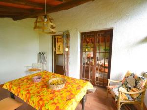 A bed or beds in a room at Holiday Home in Tuscany near Abetone Ski Lift