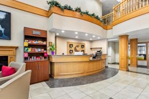 a lobby of a pharmacy with a pharmacy counter at Comfort Suites Clackamas in Clackamas +55 photos